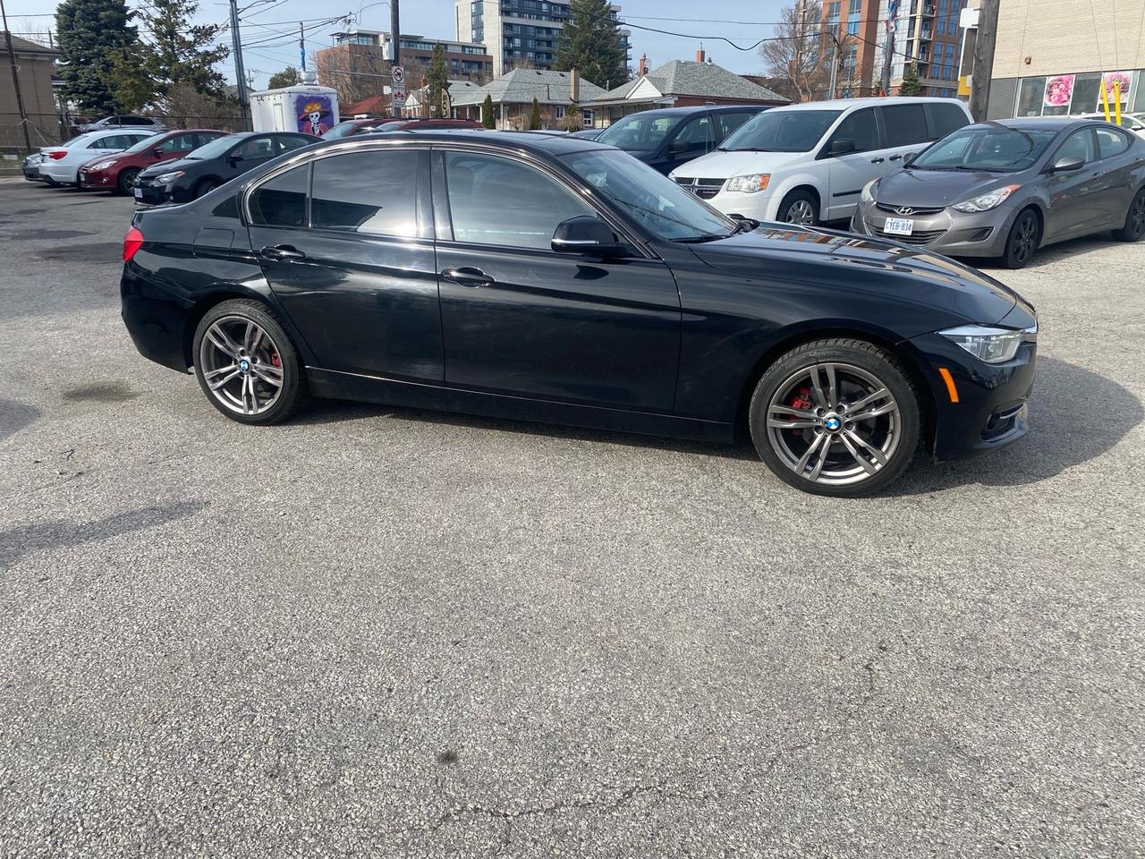 2017 BMW 3 Series 4dr Sdn 320i xDrive AWD Photo