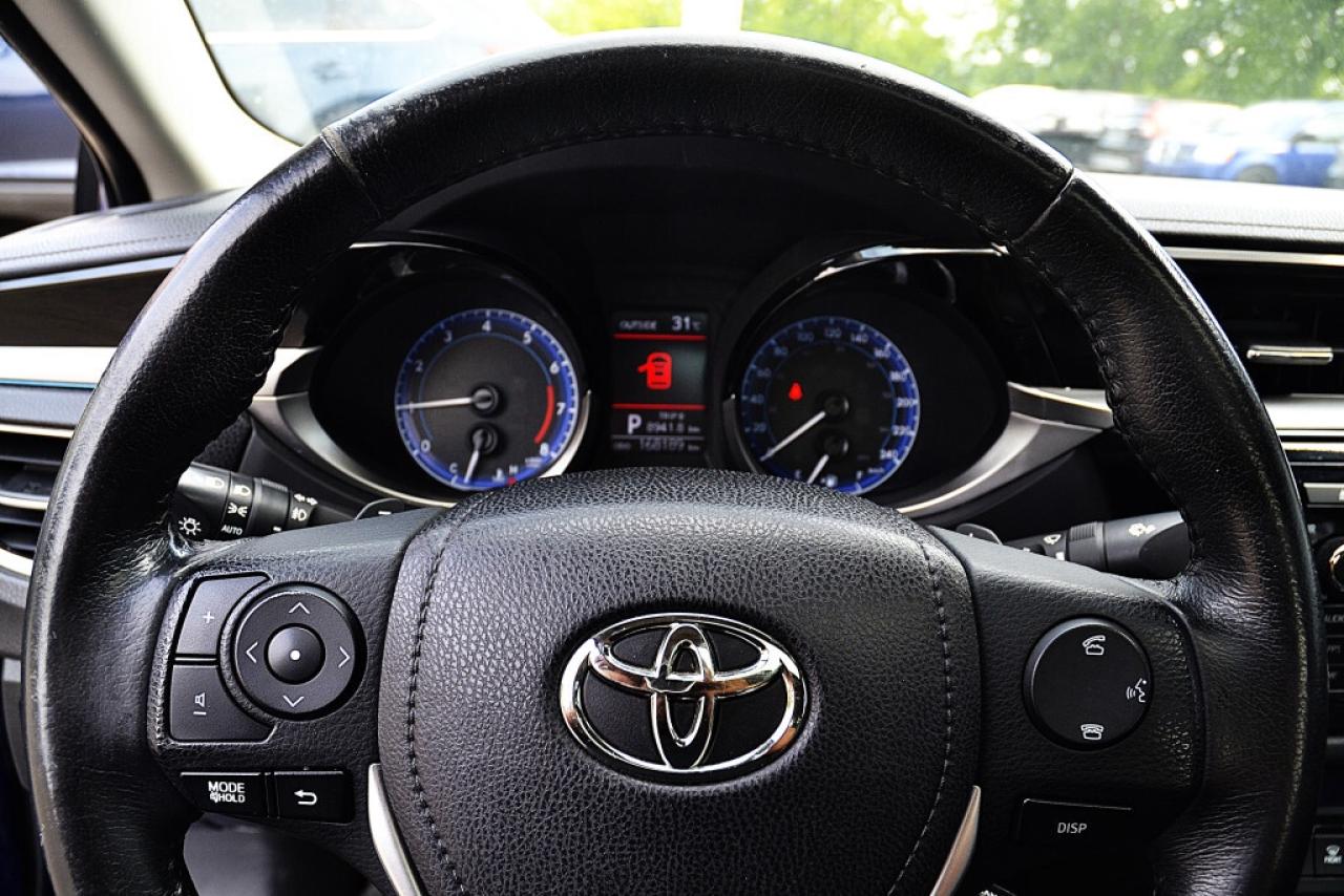 2015 Toyota Corolla LE Plus 4dr Sedan CVT Photo