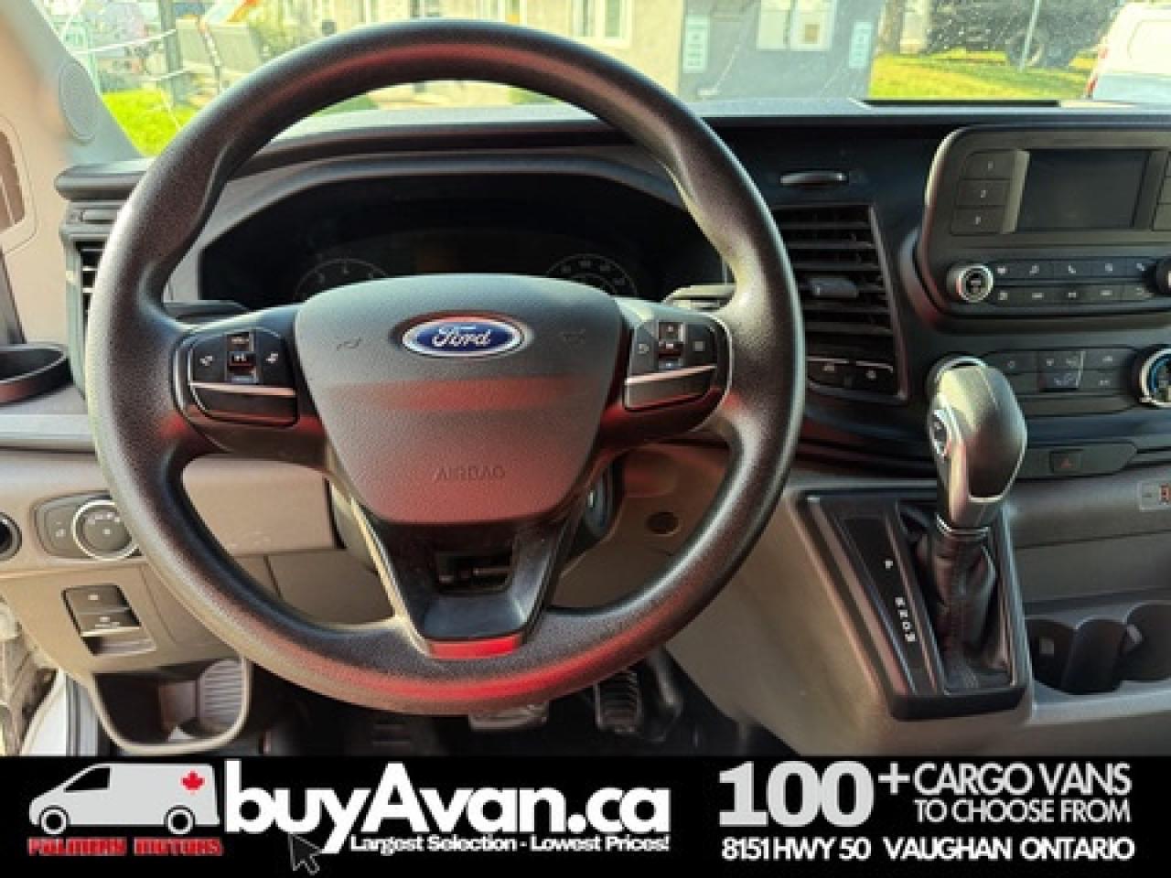 2023 Ford Transit Cargo Van T-250 148" Mid Roof + Divider Photo