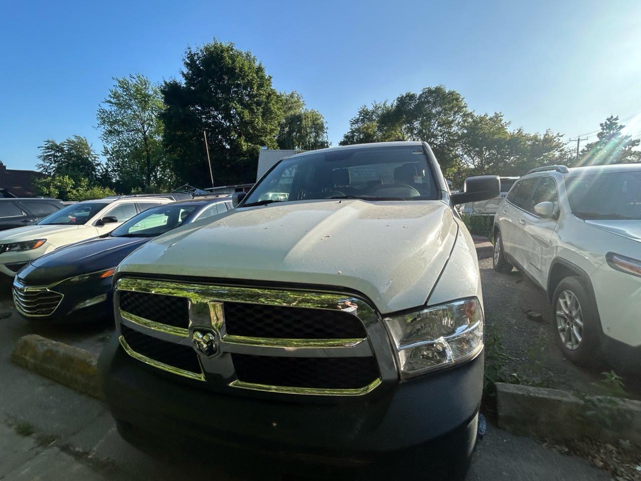2018 RAM 1500 Tradesman 4x4 Quad Cab 6'4 Box Photo2