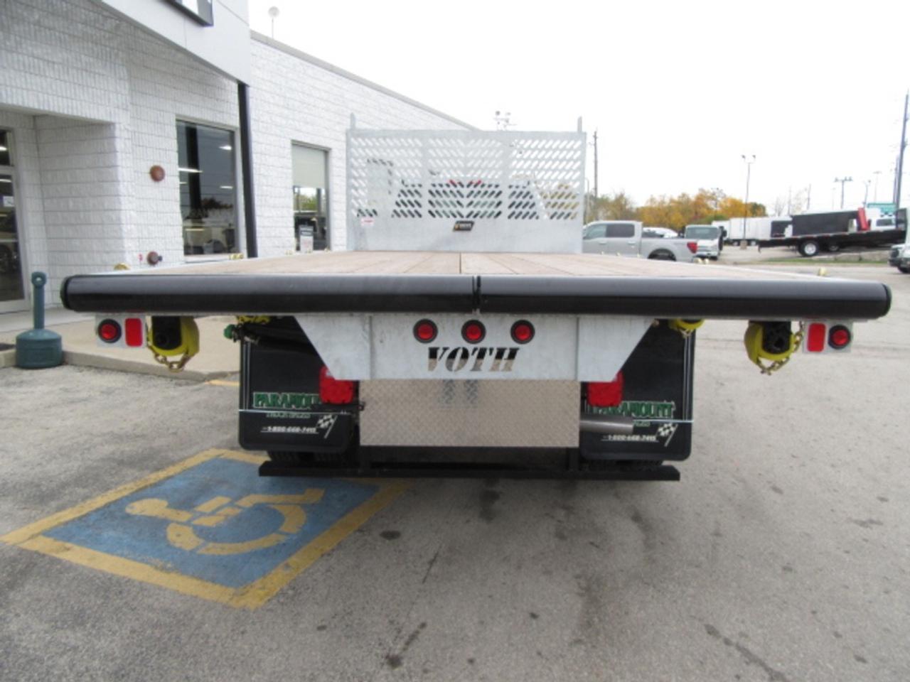 2024 RAM 5500 HD Chassis DIESEL REG CAB 4X4 WITH 16 FT DUMPING FLAT DECK Photo