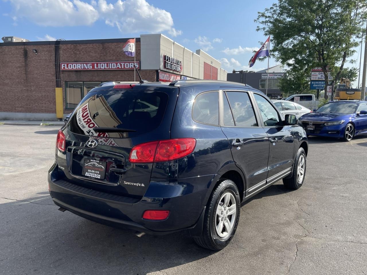 2009 Hyundai Santa Fe GL 5SPD   Steering Controls   Power Windows   Powe Photo4