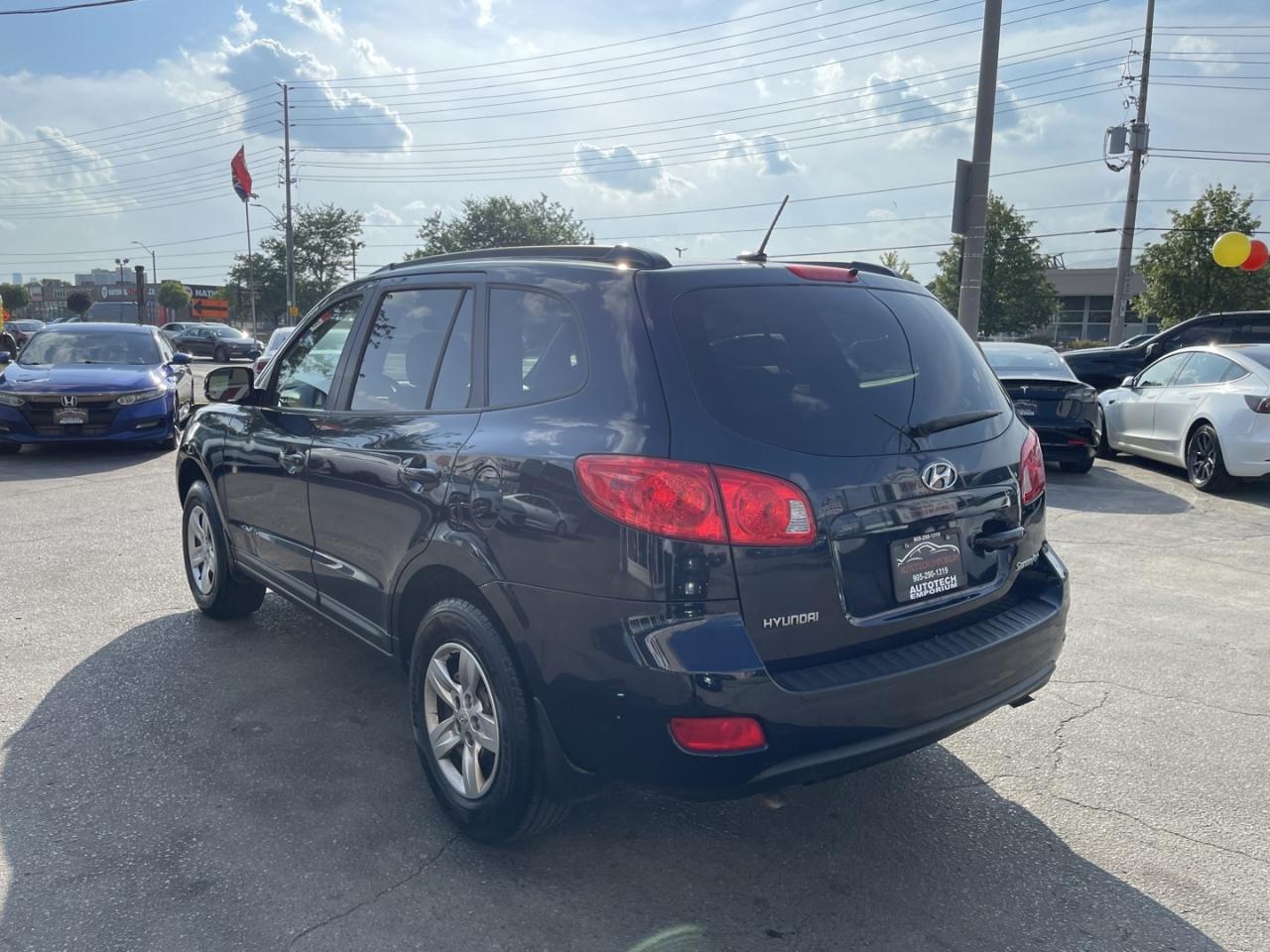 2009 Hyundai Santa Fe GL 5SPD   Steering Controls   Power Windows   Powe Photo