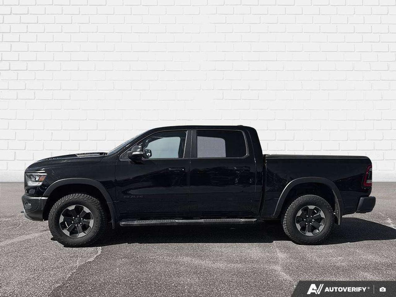 2019 RAM 1500 SPRAY IN BEDLINER. TONNEAU COVER. RUNNING BOARDS. SUNROOF. TRAILER BRAKE CONTROLLER. CERTIFIED. Photo