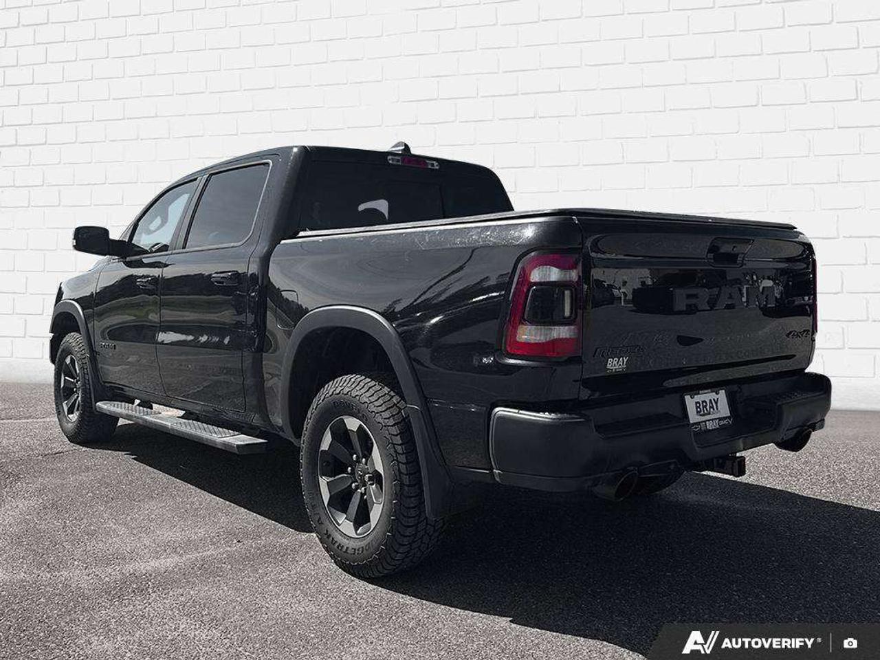 2019 RAM 1500 SPRAY IN BEDLINER. TONNEAU COVER. RUNNING BOARDS. SUNROOF. TRAILER BRAKE CONTROLLER. CERTIFIED. Photo