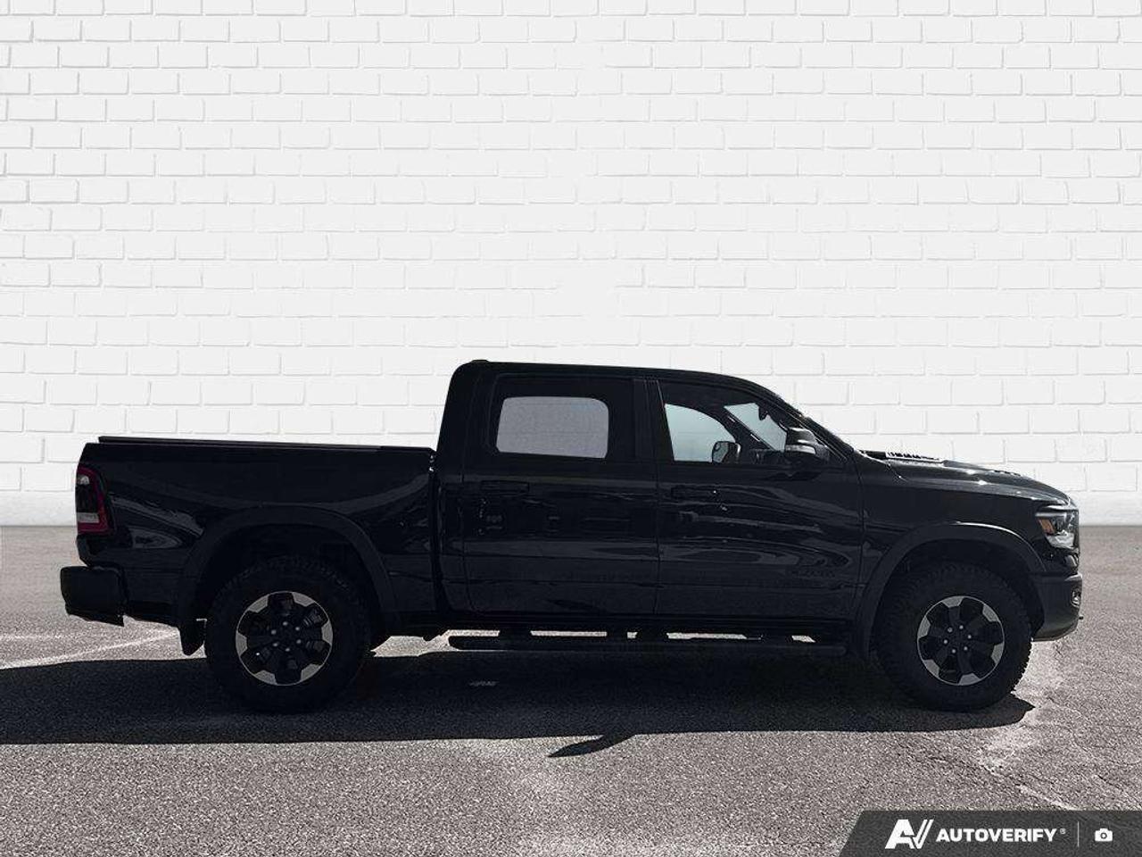 2019 RAM 1500 SPRAY IN BEDLINER. TONNEAU COVER. RUNNING BOARDS. SUNROOF. TRAILER BRAKE CONTROLLER. CERTIFIED. Photo
