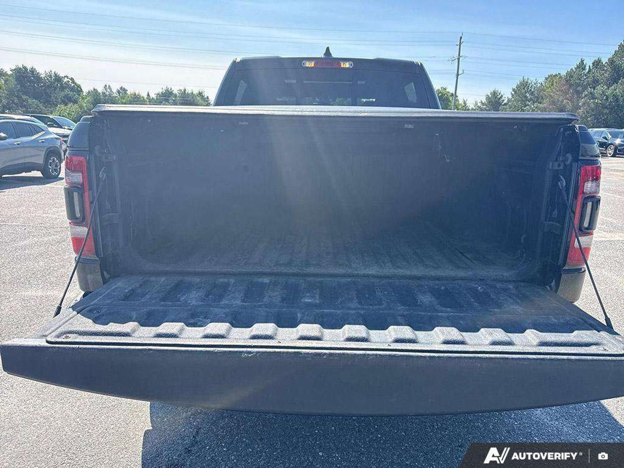 2019 RAM 1500 SPRAY IN BEDLINER. TONNEAU COVER. RUNNING BOARDS. SUNROOF. TRAILER BRAKE CONTROLLER. CERTIFIED. Photo