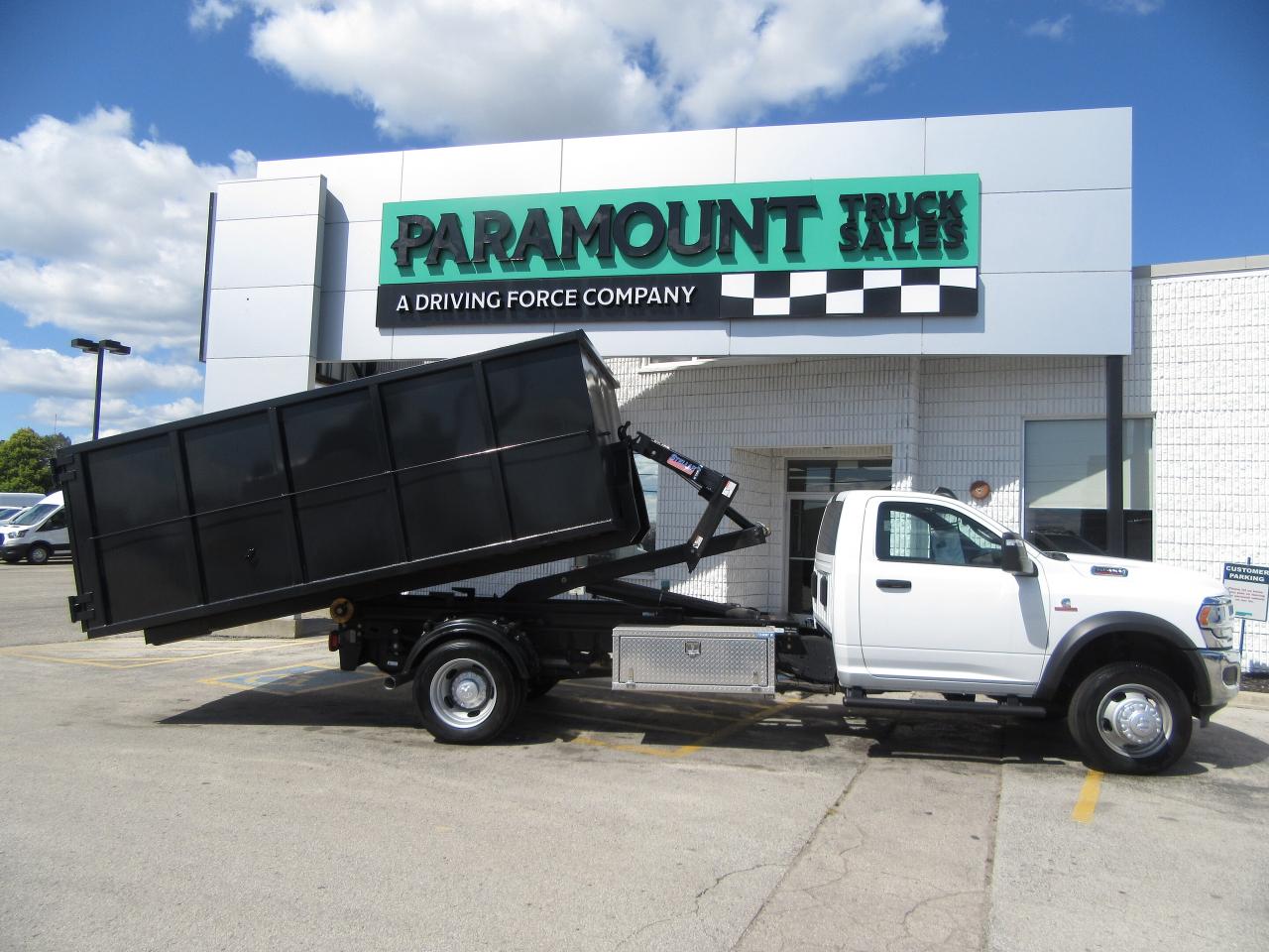 2024 RAM 5500 DIESEL REG CAB 4X4 WITH NEW STELLAR HOOK LIFT Photo