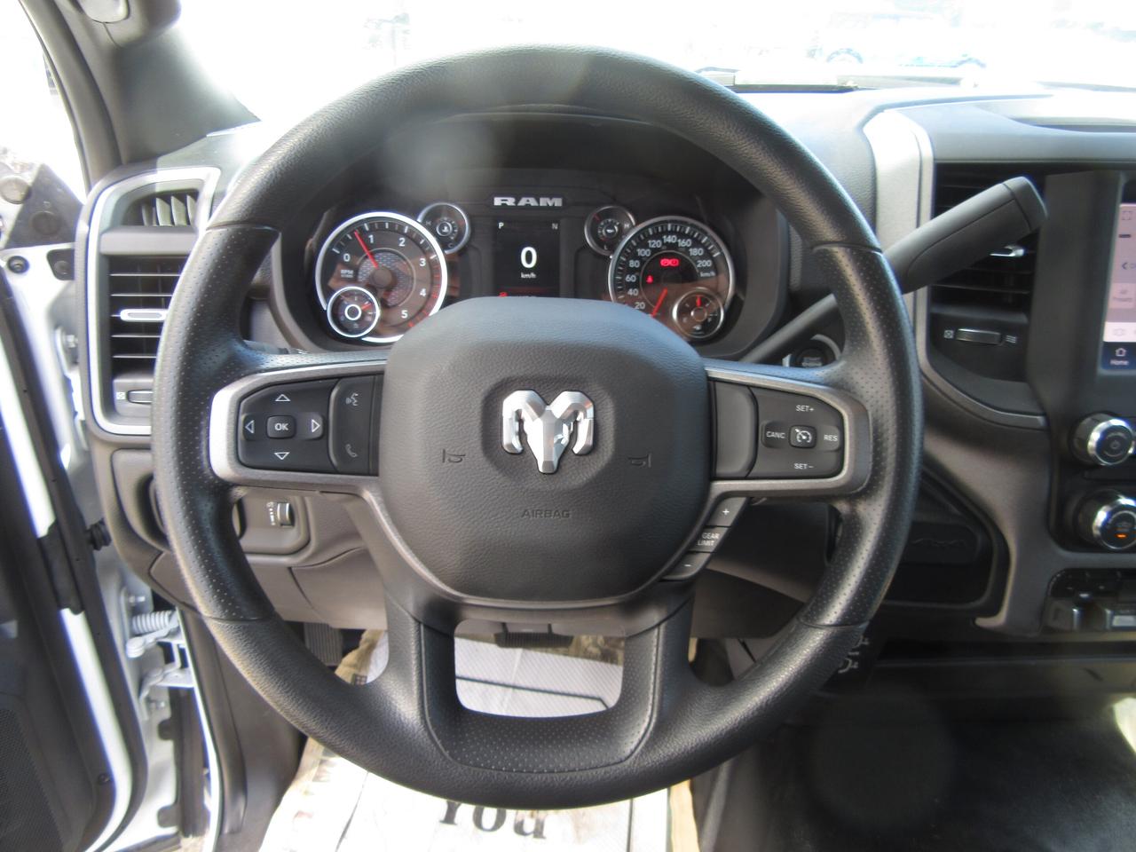 2024 RAM 5500 DIESEL REG CAB 4X4 WITH NEW STELLAR HOOK LIFT Photo