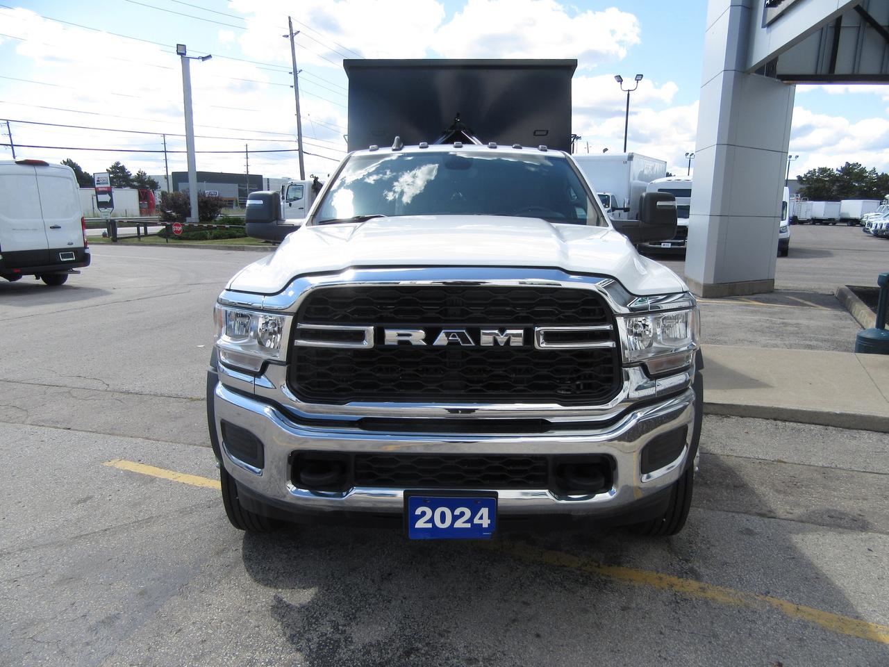 2024 RAM 5500 DIESEL REG CAB 4X4 WITH NEW STELLAR HOOK LIFT Photo