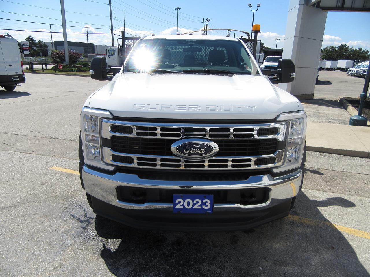 2023 Ford F-550 DIESEL 4X4 WITH 14 FT FLAT DECK/TOW PKG Photo