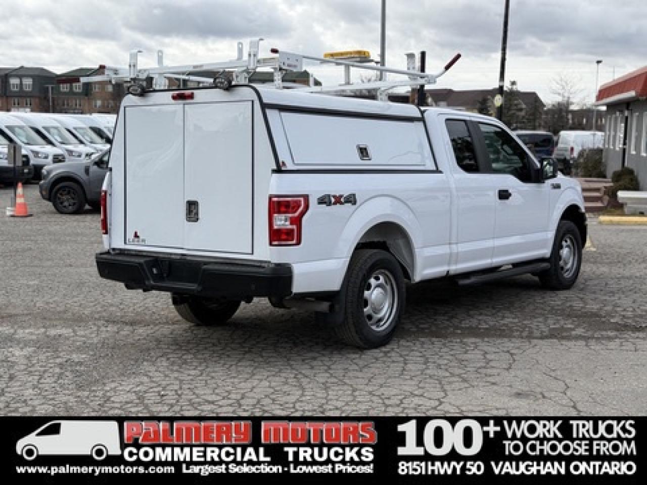 2019 Ford F-150 Super Cab 4x4 + Utility Cap W/Racks Photo
