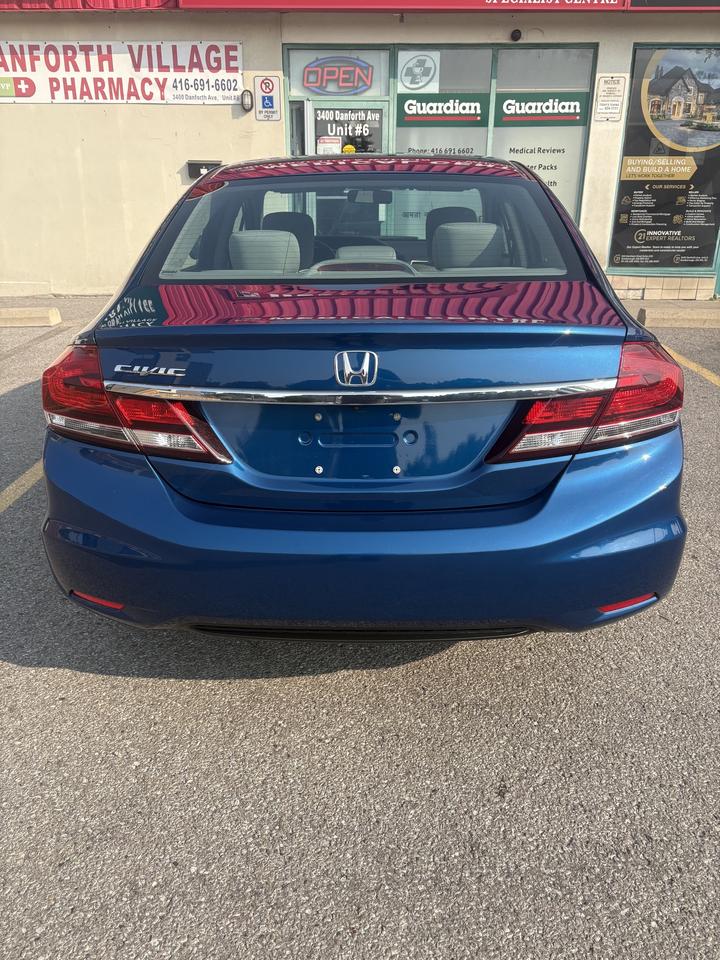 2015 Honda Civic Sedan 4dr Auto LX Photo