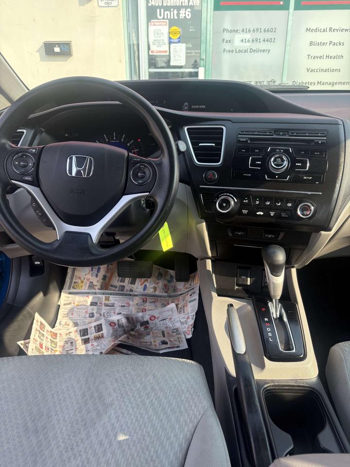 2015 Honda Civic 4dr Auto LX Photo