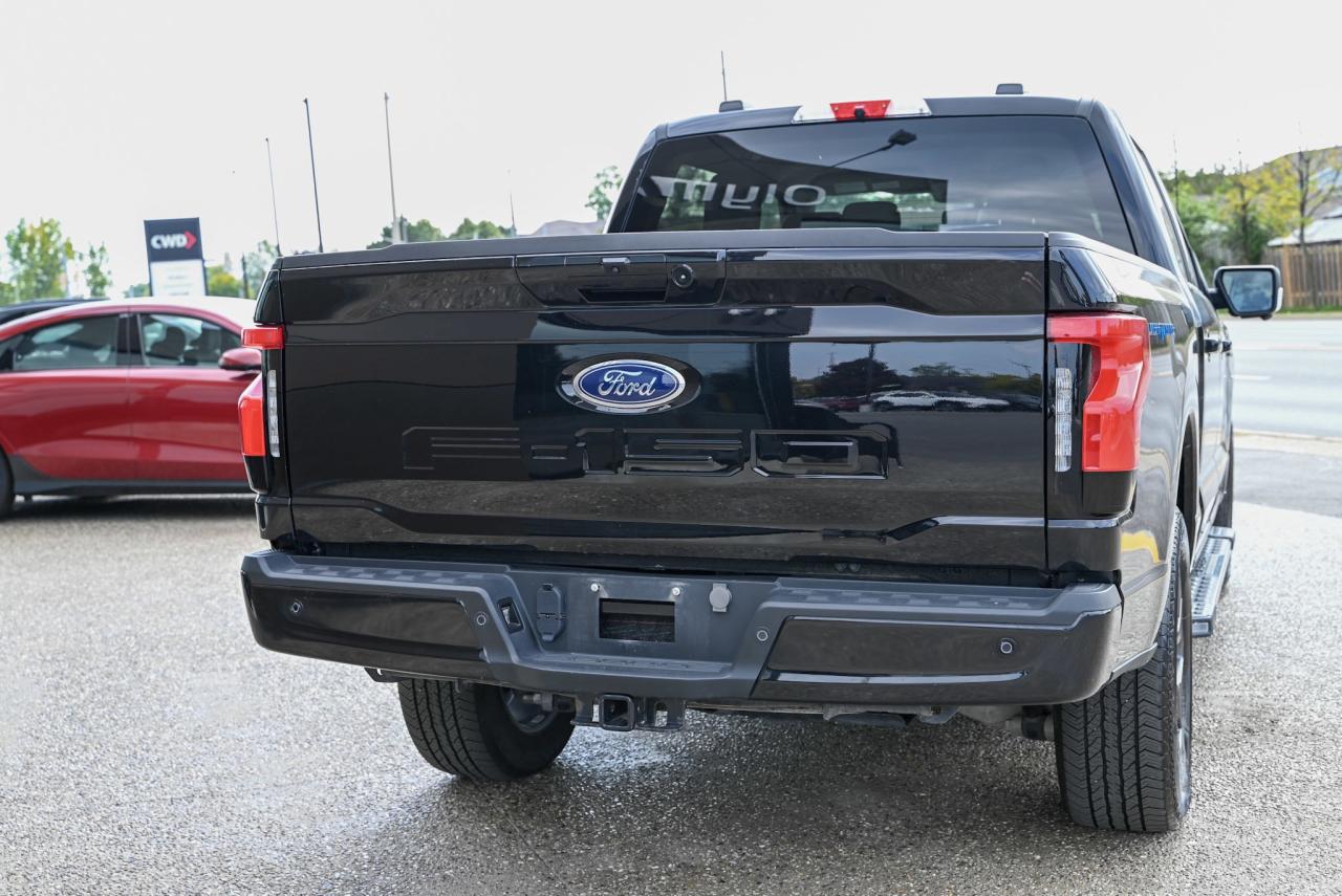 2023 Ford F-150 Lightning XLT , NO ACCIDENTS, HARD TONEAU COVER, SIDE STEPS Photo