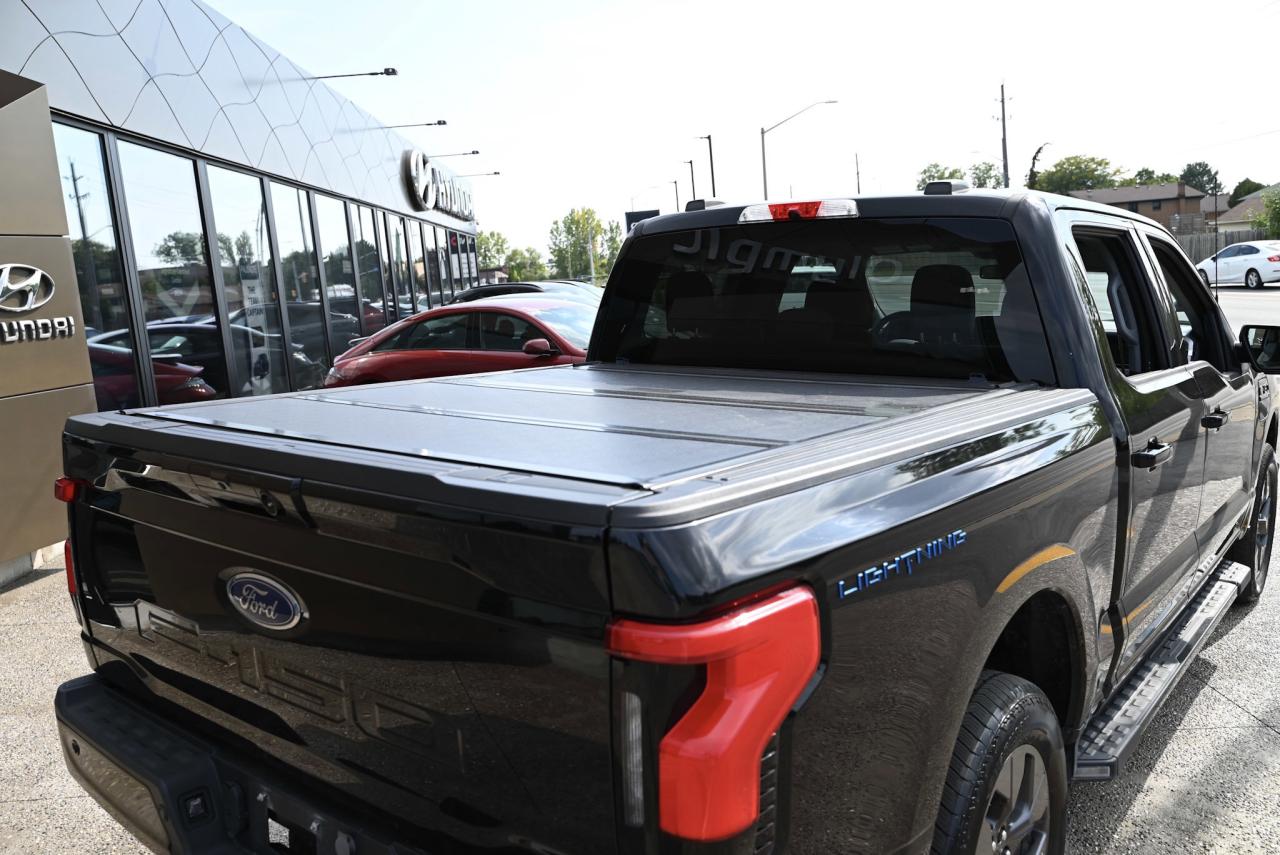 2023 Ford F-150 Lightning XLT , NO ACCIDENTS, HARD TONEAU COVER, SIDE STEPS Photo