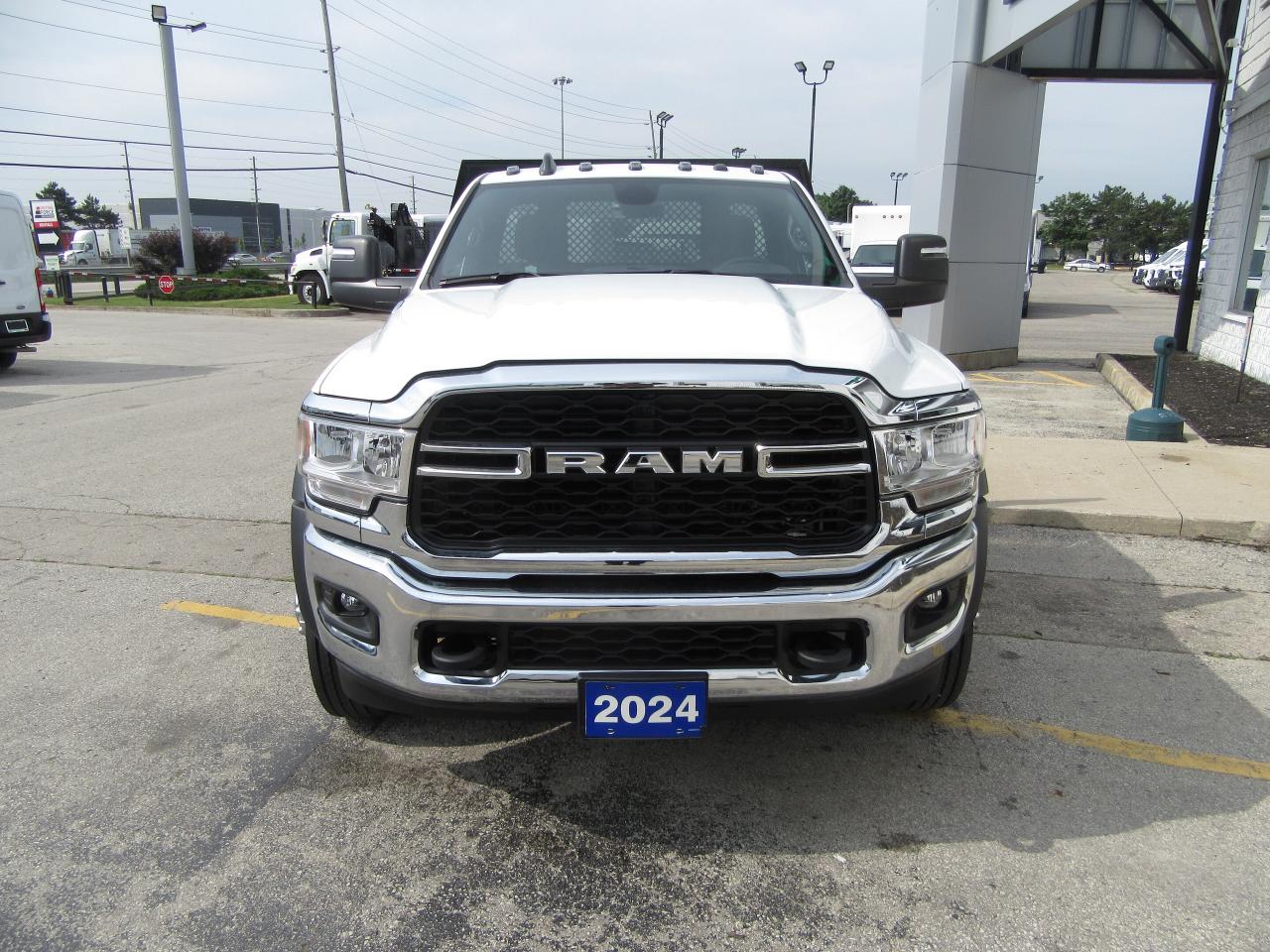 2024 RAM 5500 DIESEL REGULAR CAB WITH 16 FT WOOD FLAT DECK Photo