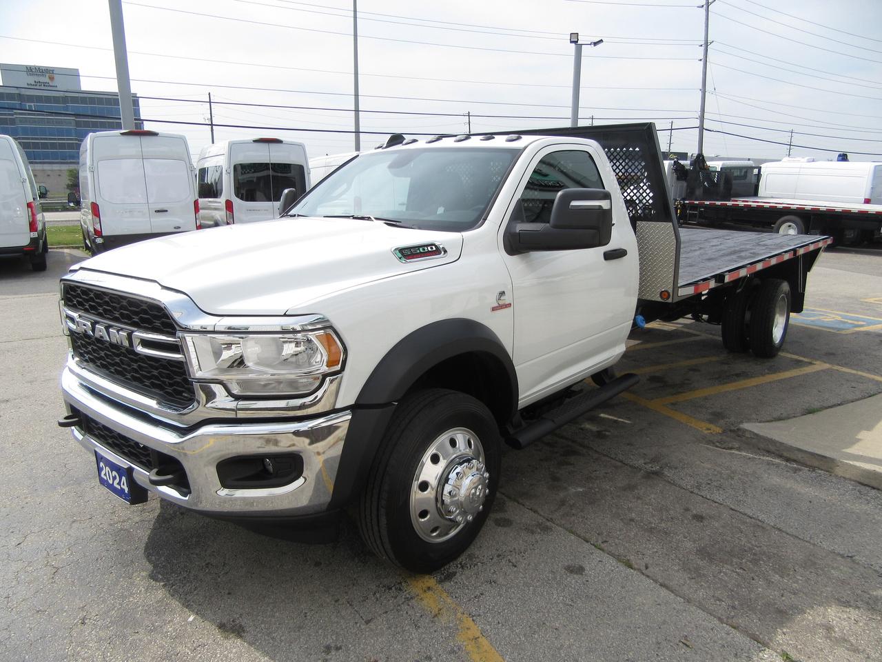 2024 RAM 5500 DIESEL REGULAR CAB WITH 16 FT WOOD FLAT DECK Photo