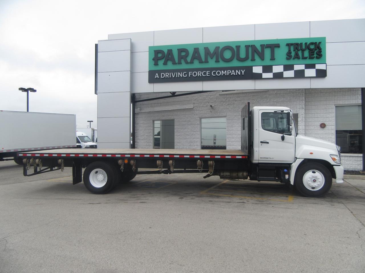 2023 Hino L7 DIESEL 24FT FLAT DECK & TIE STRAP PKG EXT WARRANTY Photo