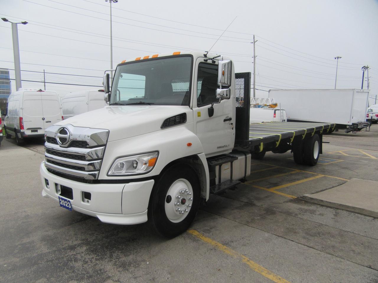 2023 Hino L7 DIESEL NEW 26FT FLAT DECK & TIE STRAP PKG Photo