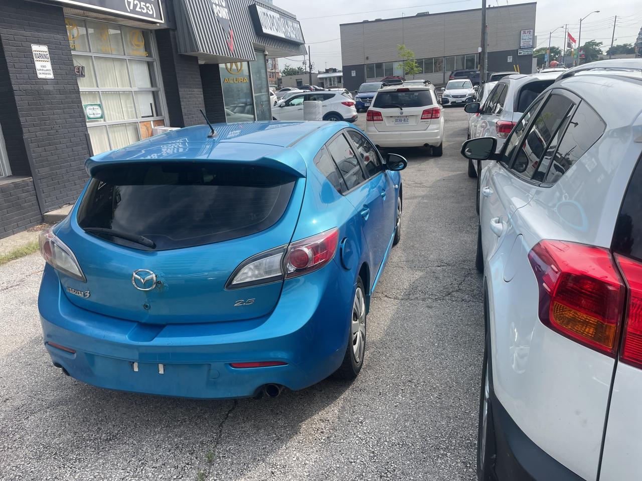 2010 Mazda MAZDA3 4dr HB Sport GS Photo