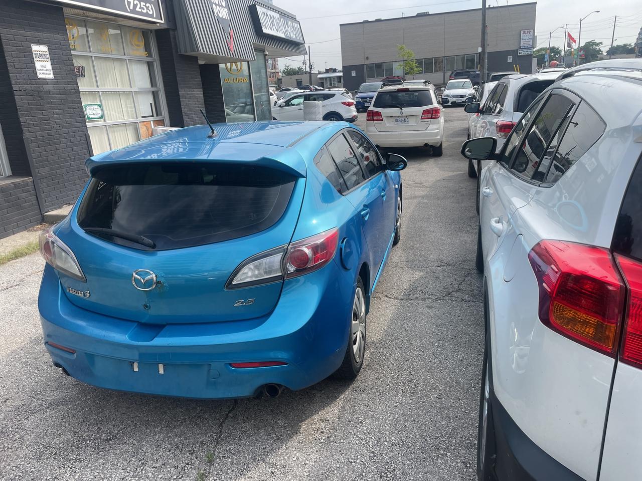 2010 Mazda MAZDA3 4dr HB Sport GS Photo