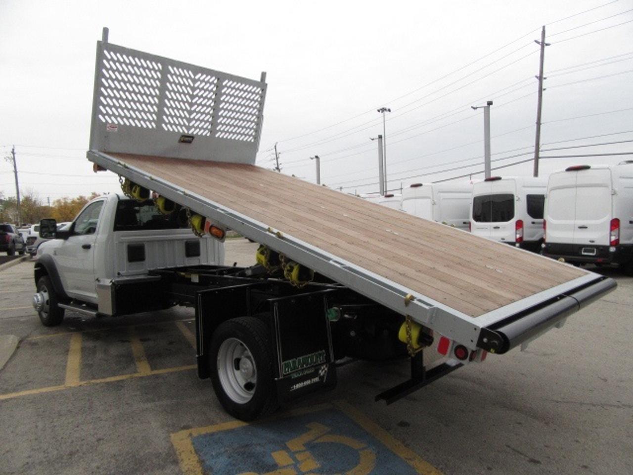 2024 RAM 5500 DIESEL 4X4 REG CAB 16 FT LUMBER DUMPING FLAT DECK Photo