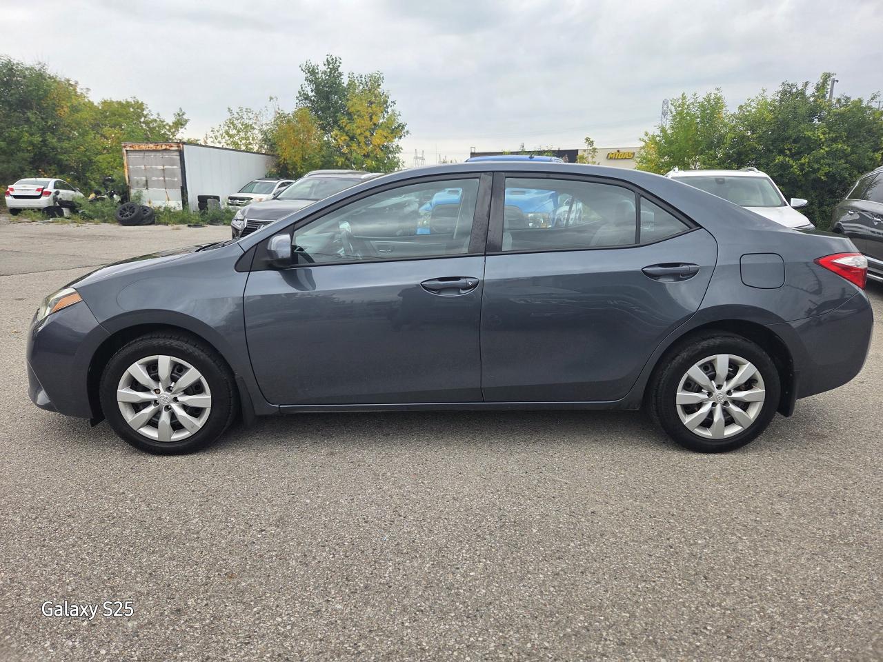 2015 Toyota Corolla LE AUTO AIR BLUE TOOTH REAR VIEW CAMERA $ 11,988.0 Photo