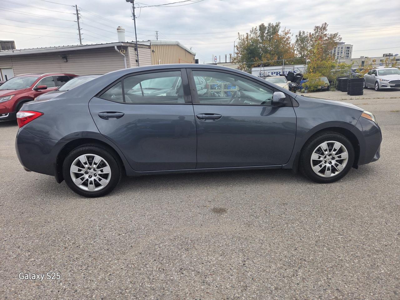 2015 Toyota Corolla LE AUTO AIR BLUE TOOTH REAR VIEW CAMERA $ 11,988.0 Photo