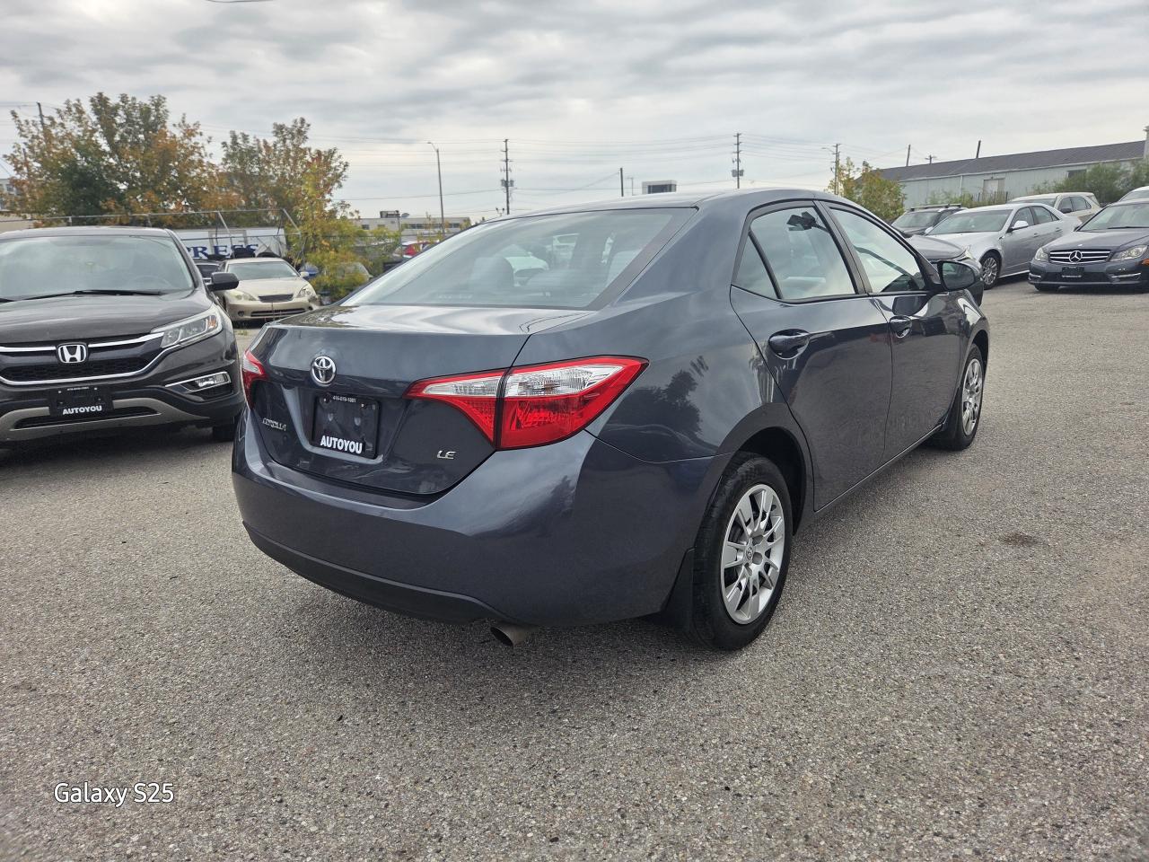 2015 Toyota Corolla LE AUTO AIR BLUE TOOTH REAR VIEW CAMERA $ 11,988.0 Photo