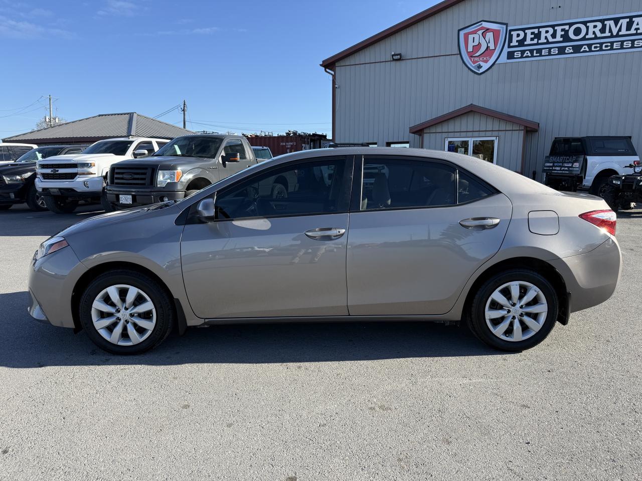 2016 Toyota Corolla 4dr Sdn CVT LE Photo
