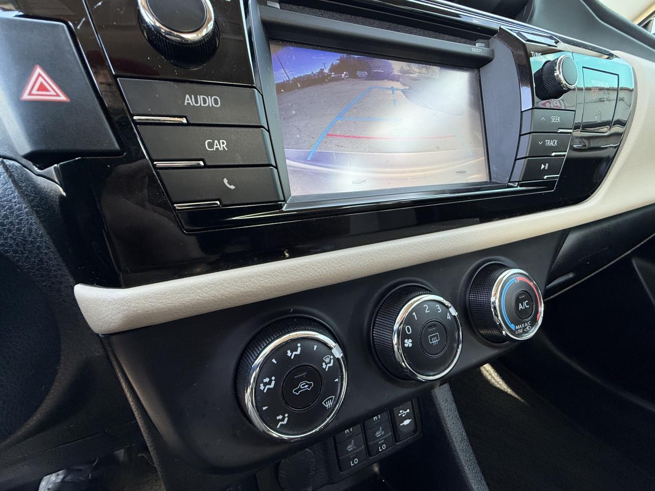 2016 Toyota Corolla 4dr Sdn CVT LE Photo