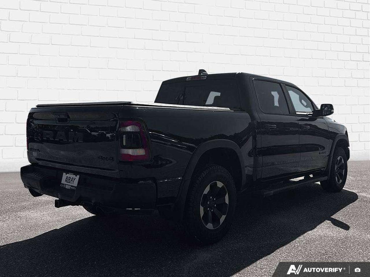 2019 RAM 1500 SPRAY IN BEDLINER. TONNEAU COVER. RUNNING BOARDS. SUNROOF. TRAILER BRAKE CONTROLLER. CERTIFIED. Photo