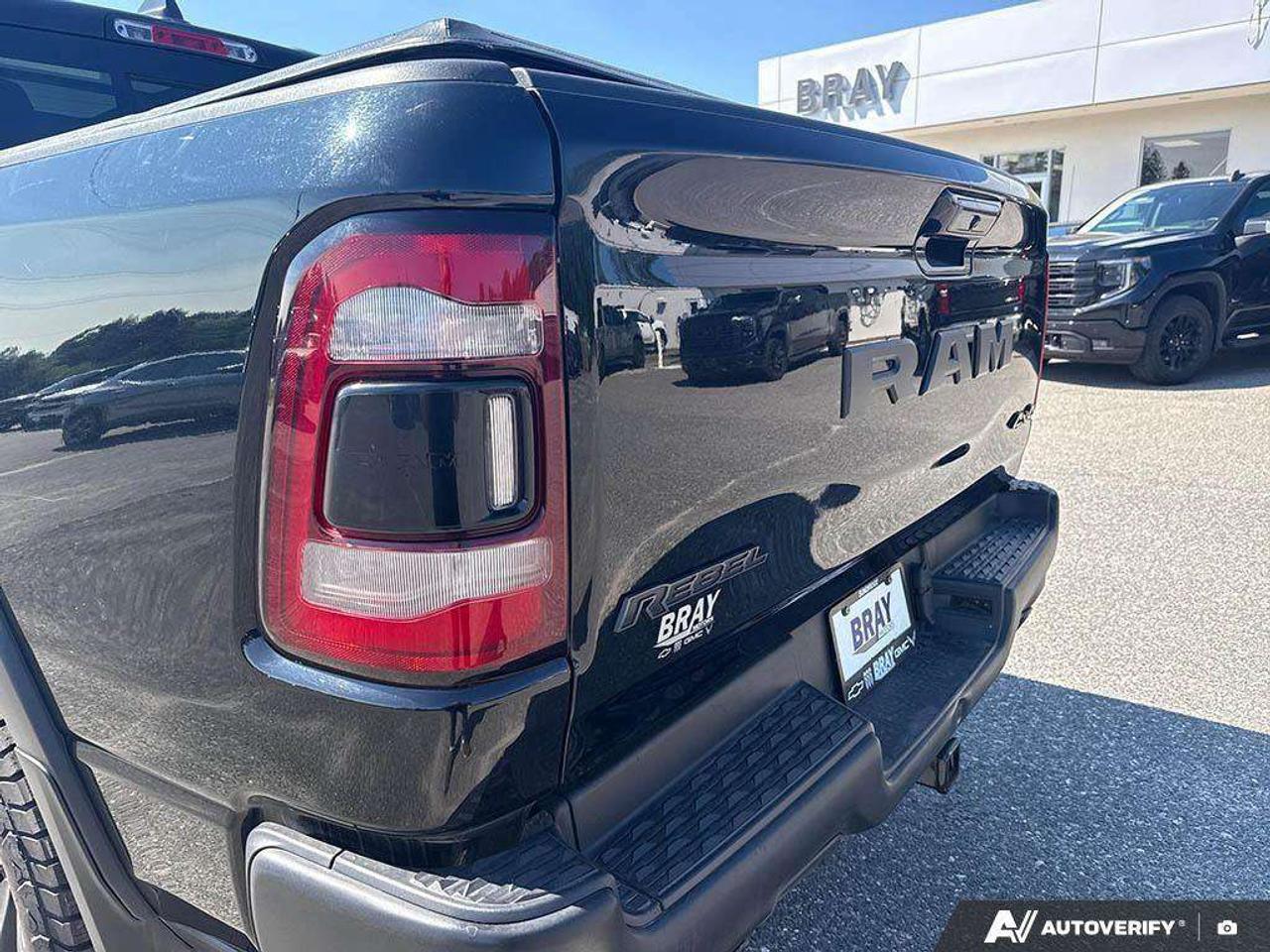 2019 RAM 1500 SPRAY IN BEDLINER. TONNEAU COVER. RUNNING BOARDS. SUNROOF. TRAILER BRAKE CONTROLLER. CERTIFIED. Photo