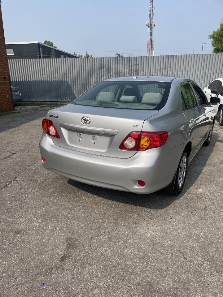 2010 Toyota Corolla 4dr Sdn Auto CE low km power locks,mirrors ac Photo