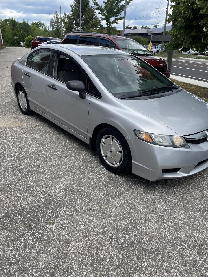 2009 Honda Civic 4dr Auto DX-G alloys ac low km Photo