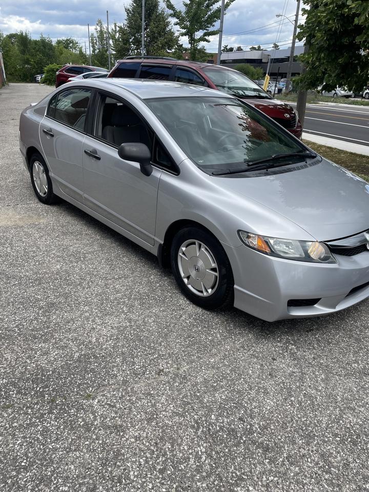 2009 Honda Civic 4dr Auto DX-G alloys ac low km Photo