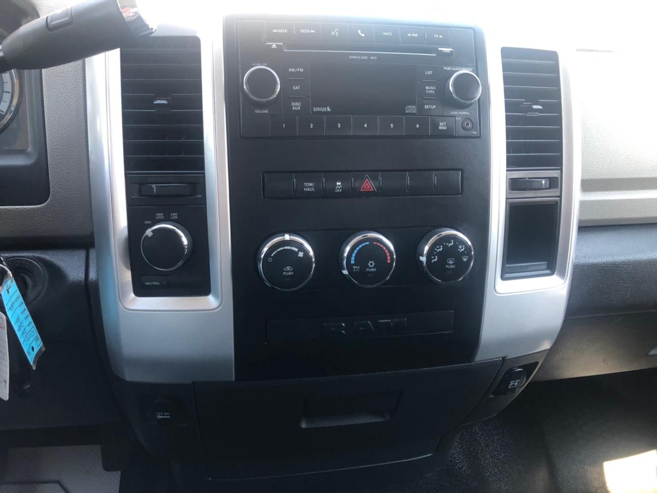 2010 Dodge Ram 1500 4WD Quad CAB 140.5 SLT Photo