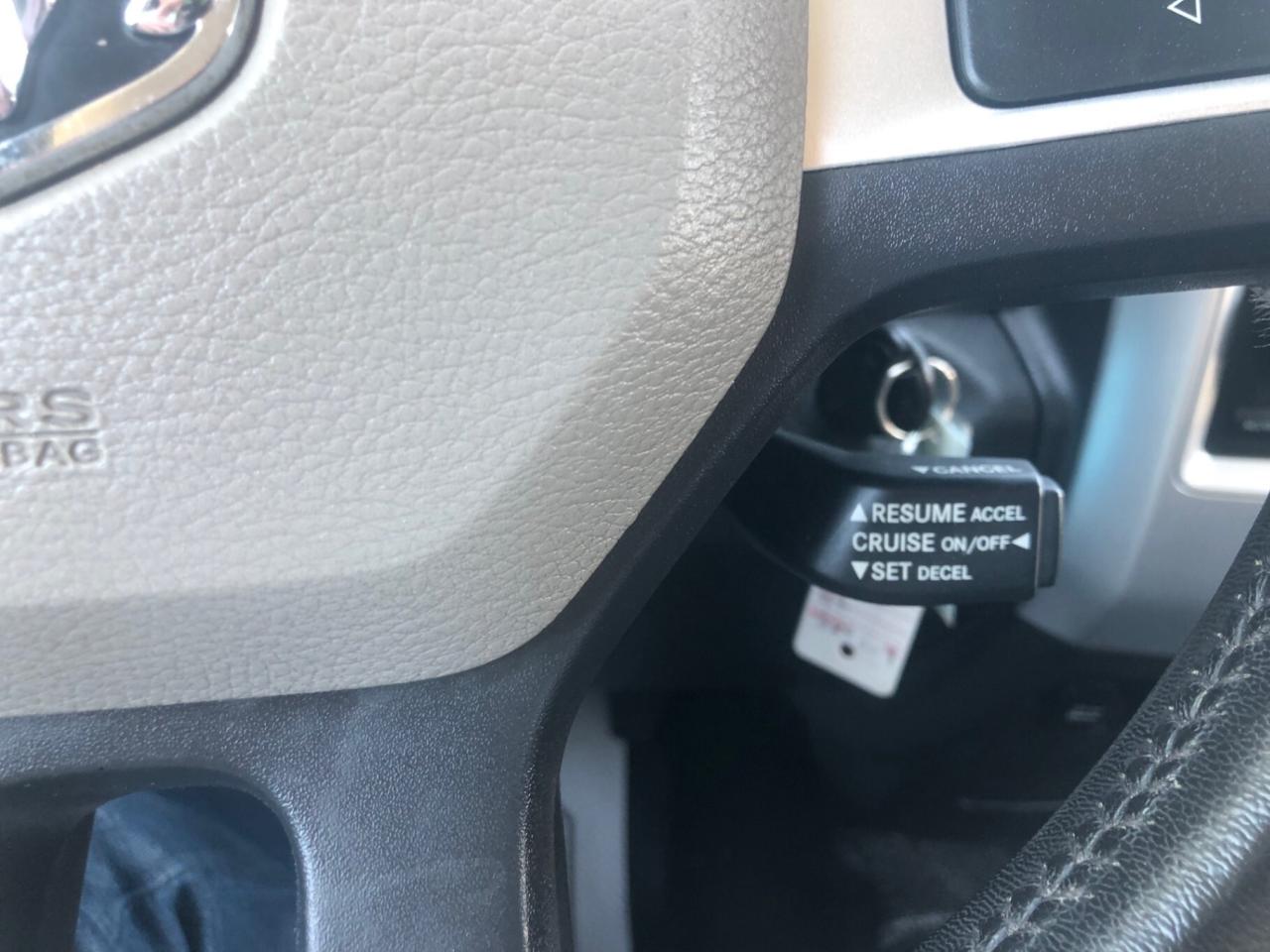 2010 Dodge Ram 1500 4WD Quad CAB 140.5 SLT Photo