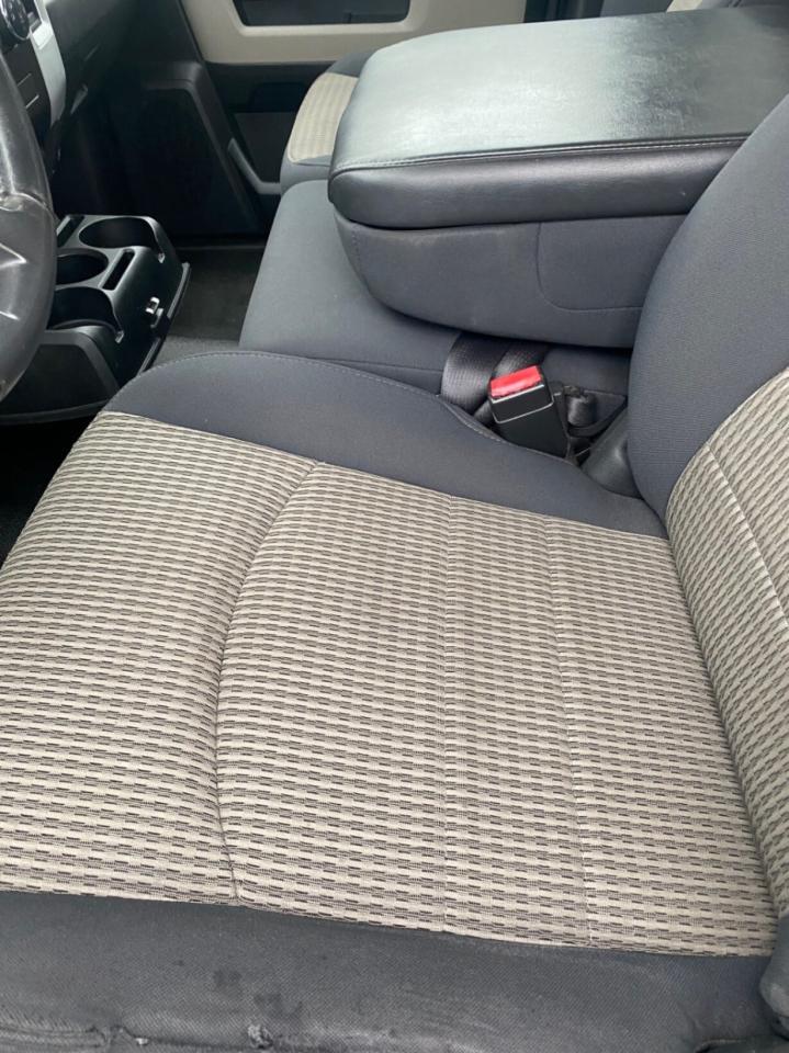 2010 Dodge Ram 1500 4WD Quad CAB 140.5 SLT Photo