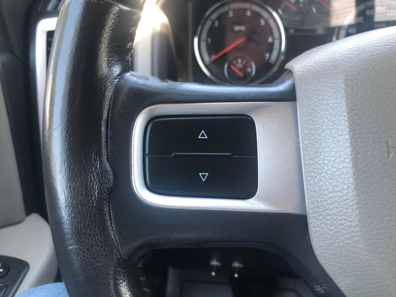 2010 Dodge Ram 1500 4WD Quad CAB 140.5 SLT Photo