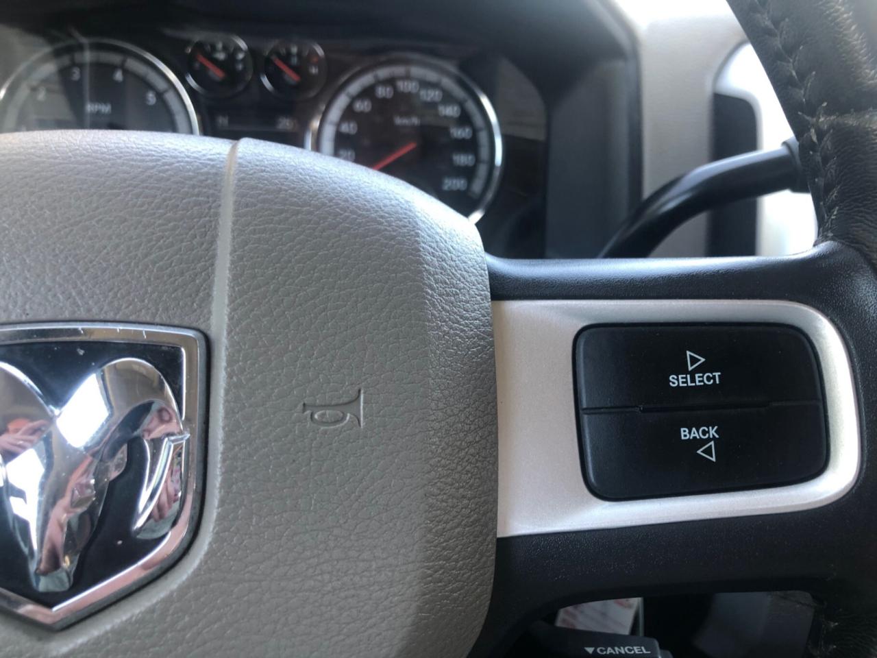 2010 Dodge Ram 1500 4WD Quad CAB 140.5 SLT Photo