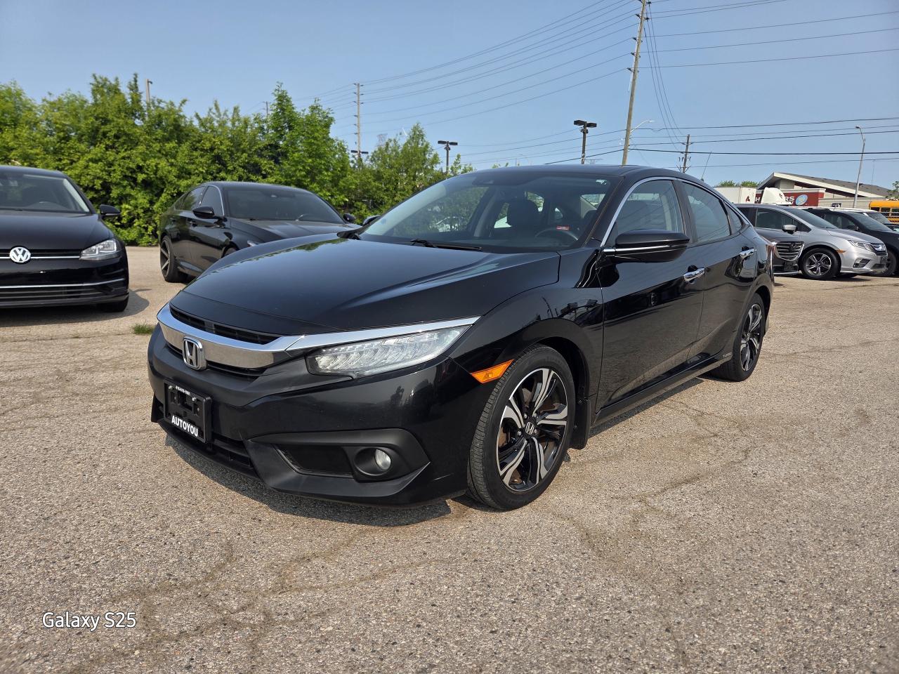 2017 Honda Civic TOURING LEATHER NAVI ROOF ALLOYS CLEAN $14,988.00 Photo