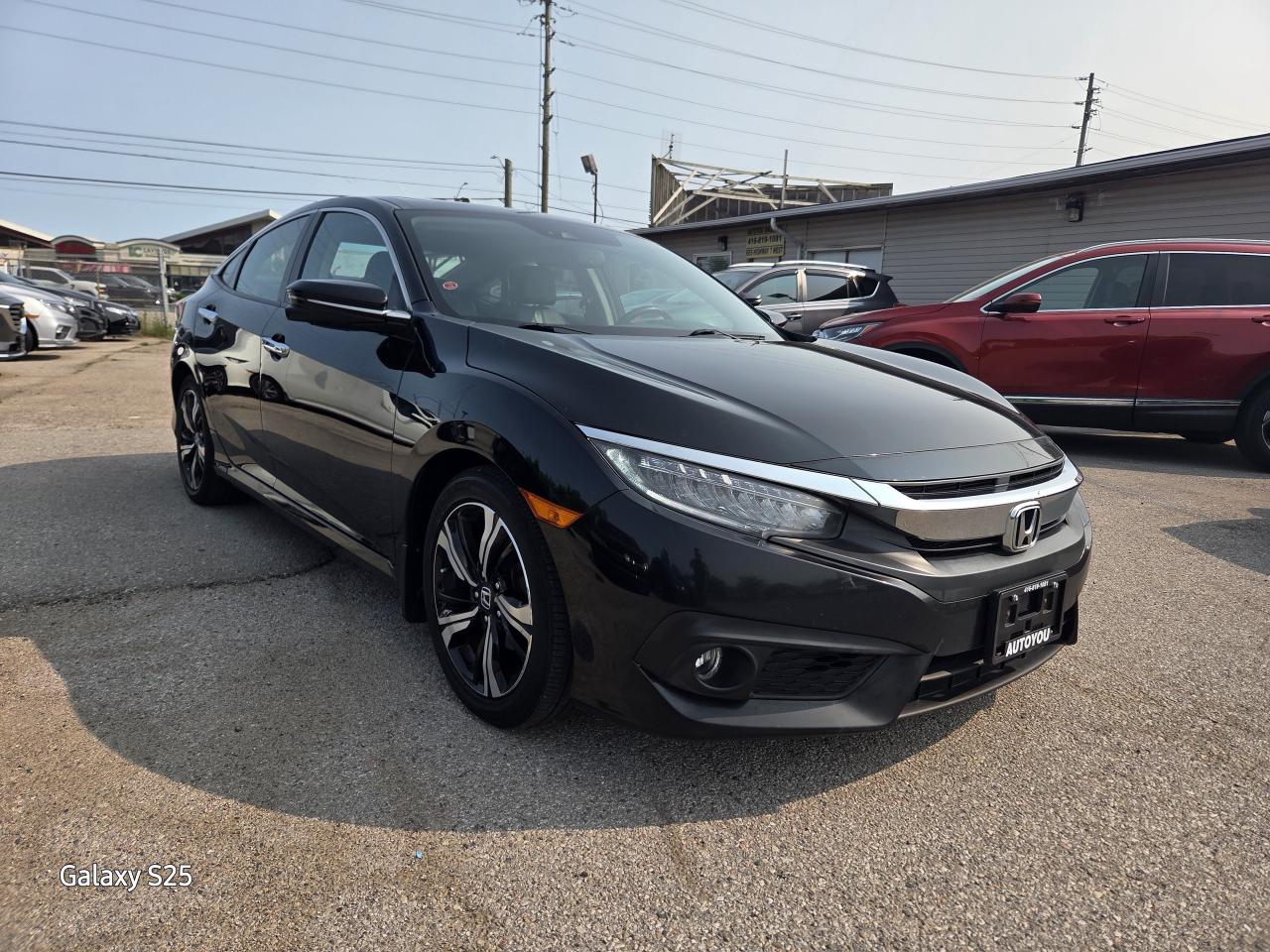 2017 Honda Civic TOURING LEATHER NAVI ROOF ALLOYS CLEAN $14,988.00 Photo