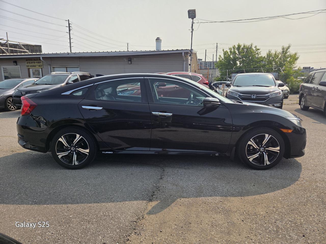 2017 Honda Civic TOURING LEATHER NAVI ROOF ALLOYS CLEAN $14,988.00 Photo