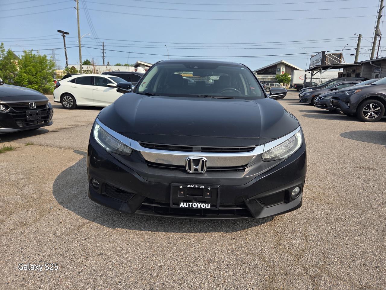 2017 Honda Civic TOURING LEATHER NAVI ROOF ALLOYS CLEAN $13,988.00 Photo