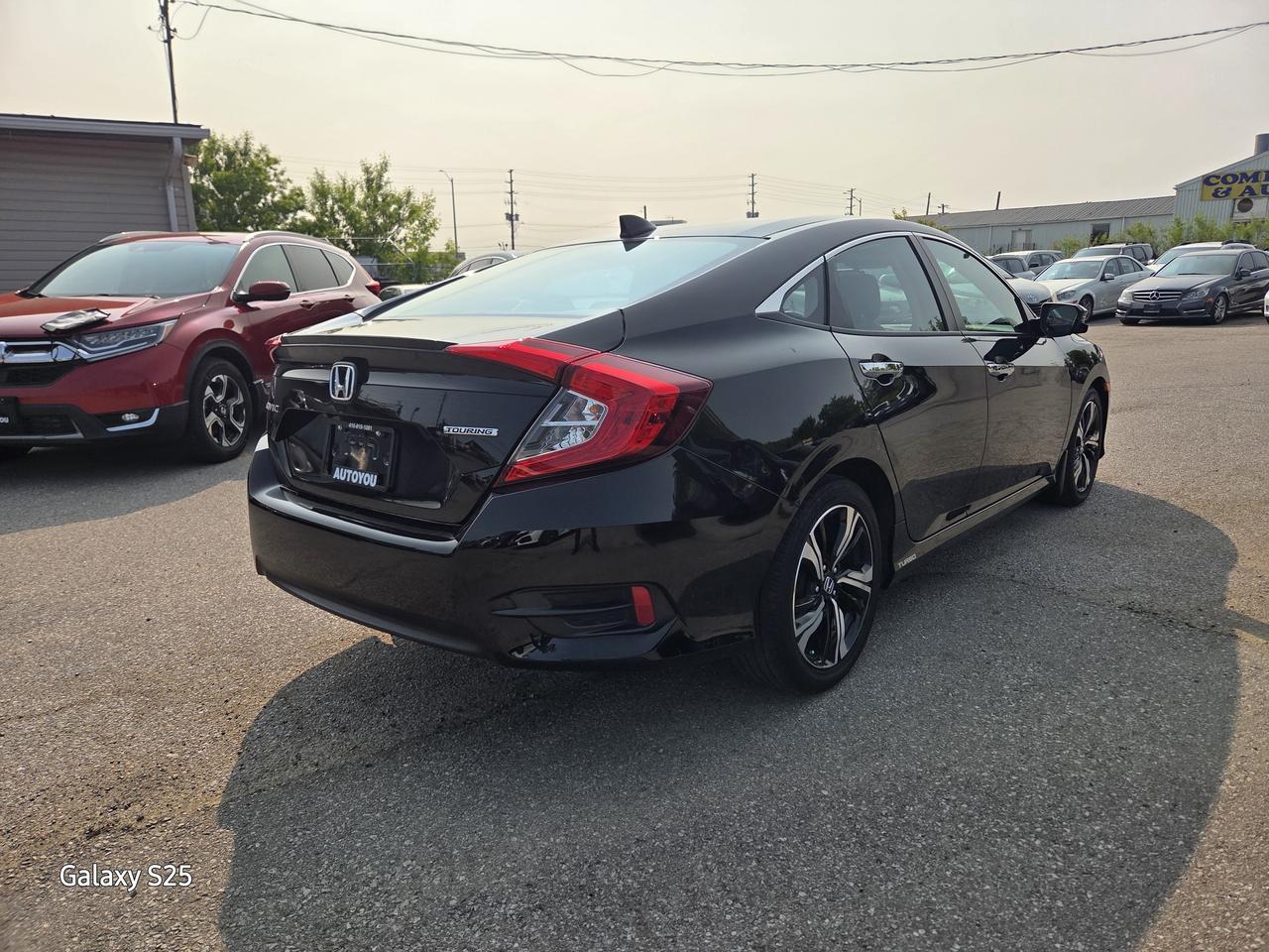 2017 Honda Civic TOURING LEATHER NAVI ROOF ALLOYS CLEAN $13,988.00 Photo