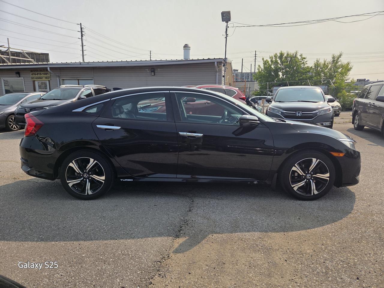 2017 Honda Civic TOURING LEATHER NAVI ROOF ALLOYS CLEAN $13,988.00 Photo