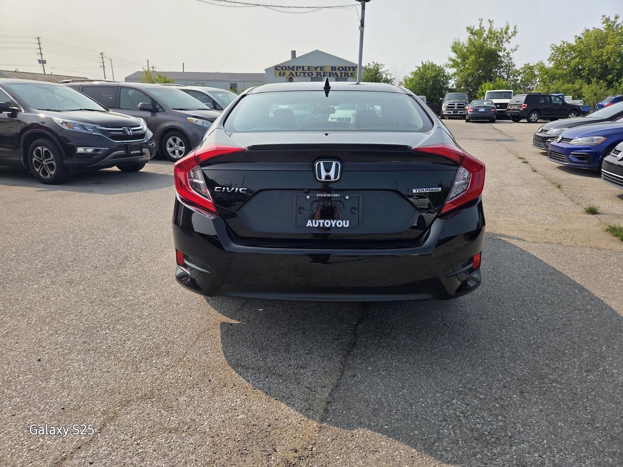 2017 Honda Civic TOURING LEATHER NAVI ROOF ALLOYS CLEAN $13,988.00 Photo