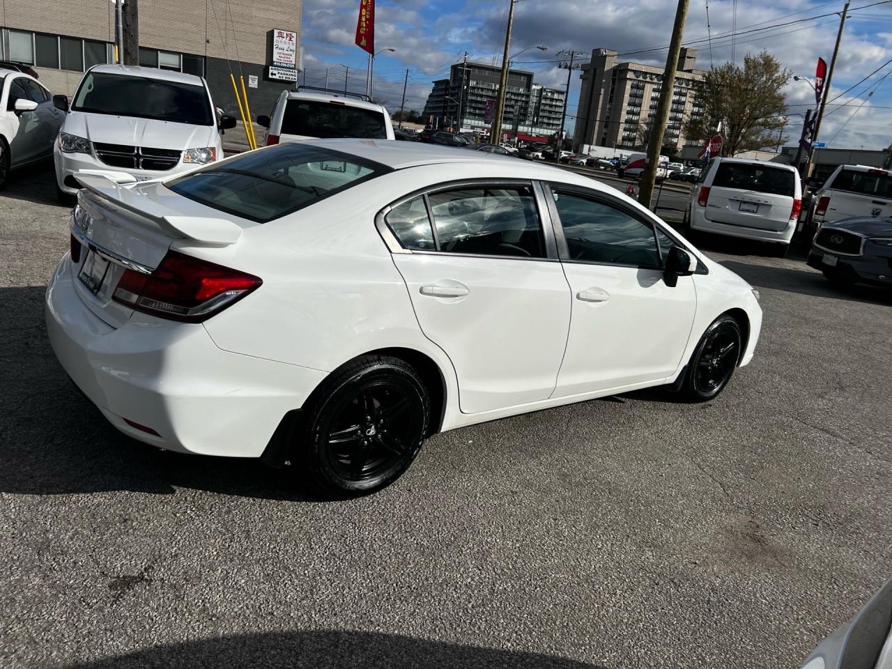 2015 Honda Civic 4dr Auto LX Photo2